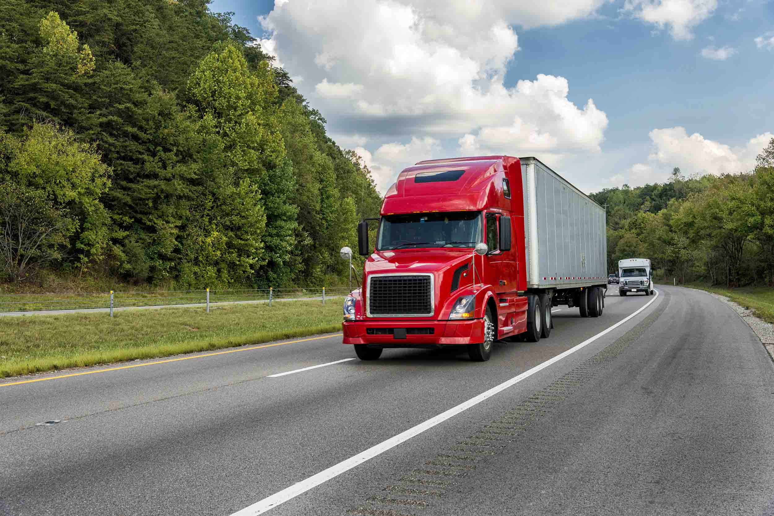 Red Semi Truck On An Interstate Highway